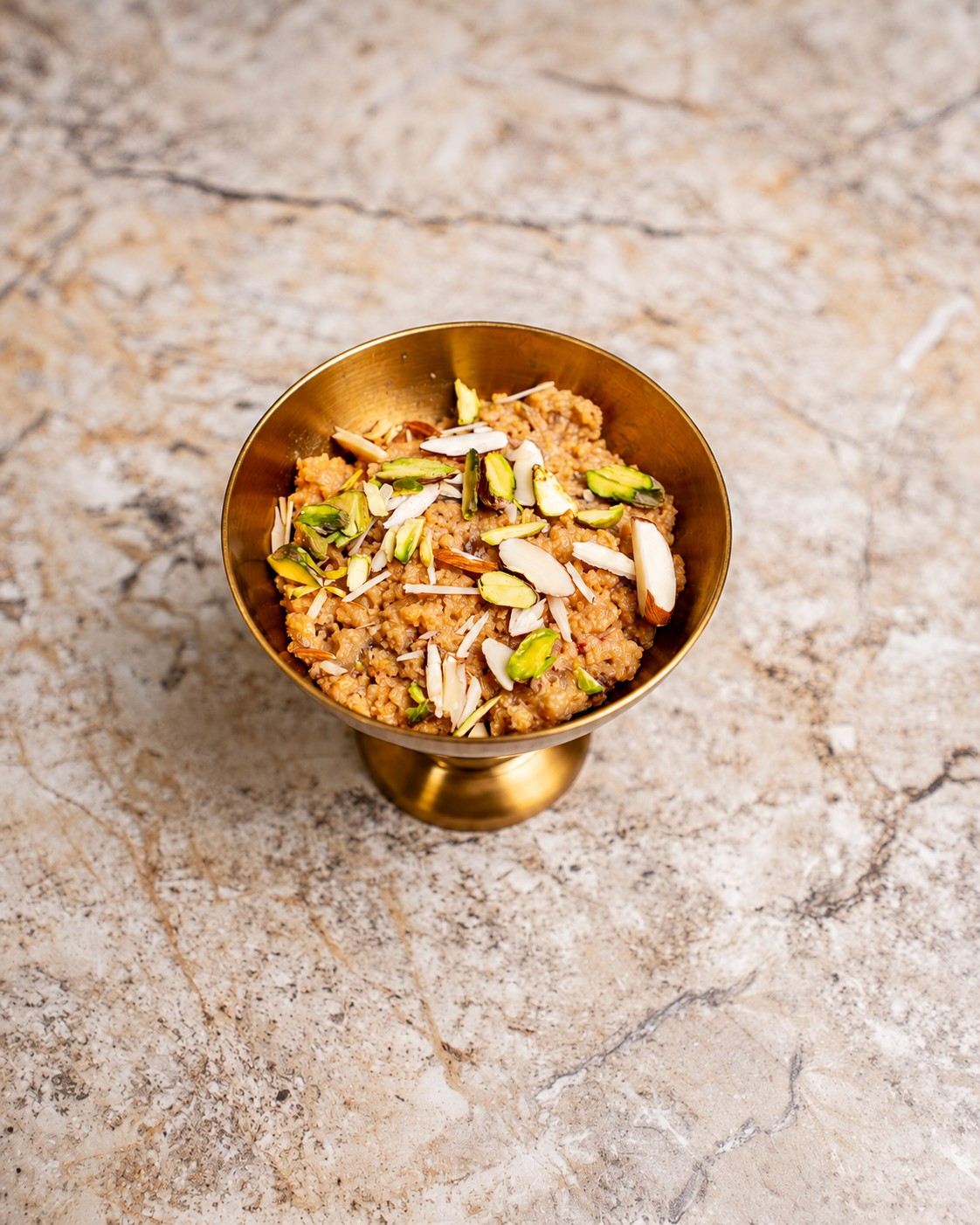 Date and walnut halwa with pistachios